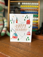 Snowy Hillside Village Holiday Card