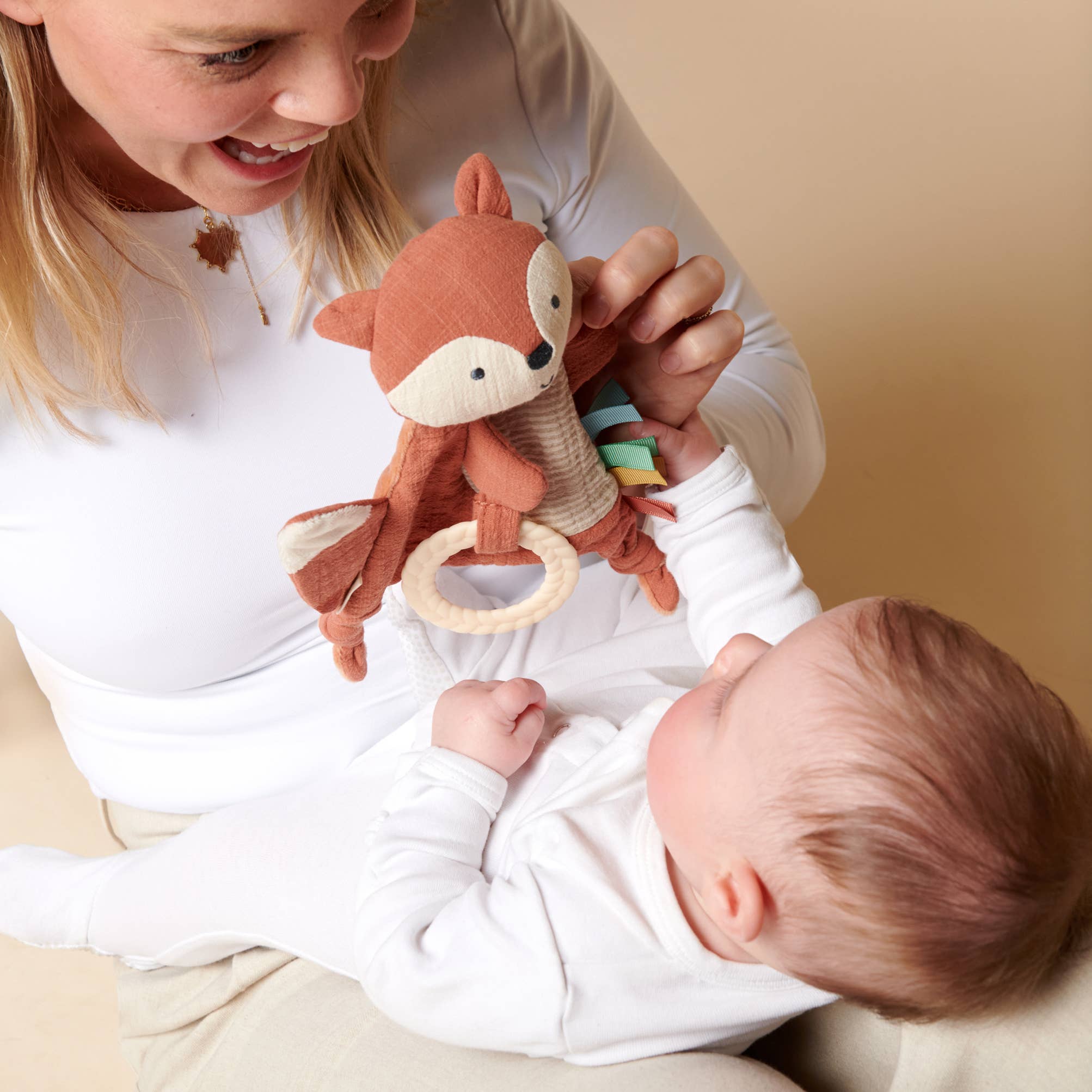 Bitzy Crinkle™ Sensory Toy With Teether